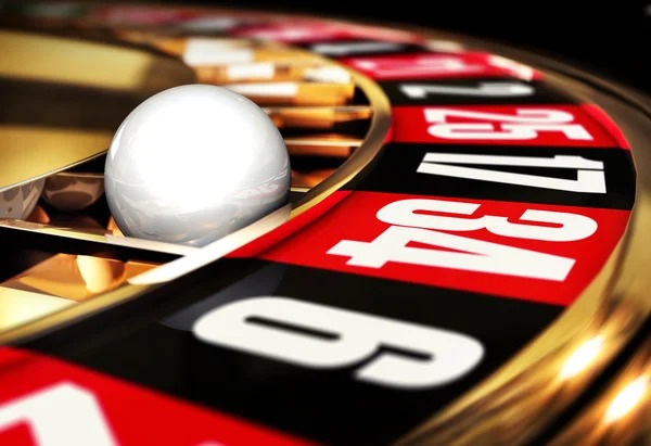 Live dealer table with roulette wheel